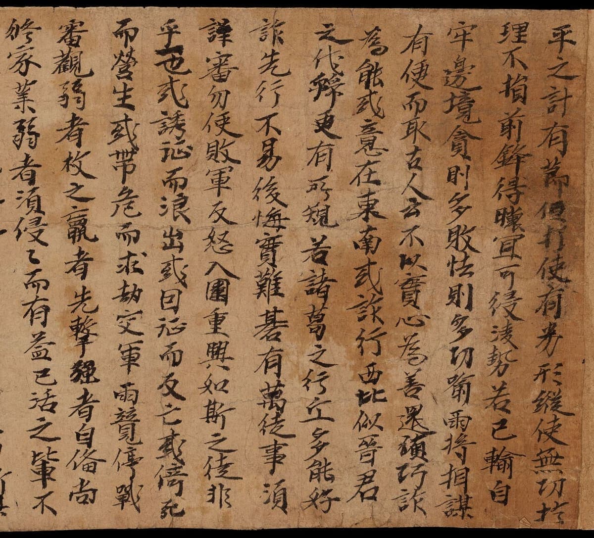 Opening columns of a Tang paper scroll written in a fluent semi-cursive hand on browned paper