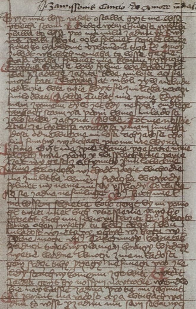 Full page of dense fifteenth-century Czech cursive on ruled lines, with a Latin heading across the top and red strokes through some capitals