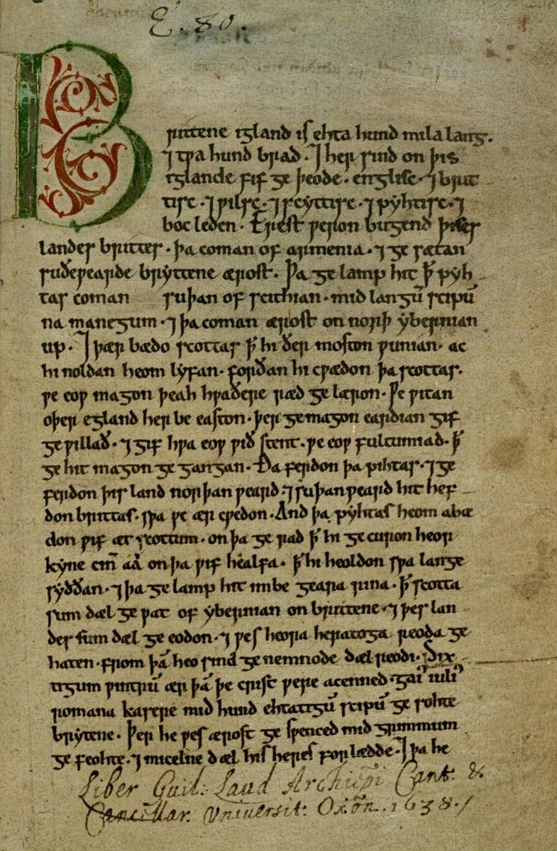 Opening page of the Peterborough Chronicle with a large red and green initial B and twenty-seven lines of English in a rounded twelfth-century hand