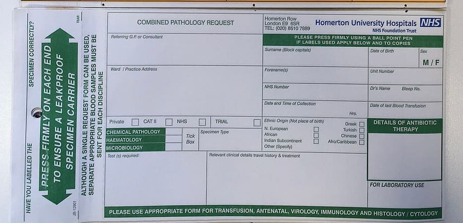 A blank NHS combined pathology request form with tick boxes, a block-capitals box for the surname and green office-use panels