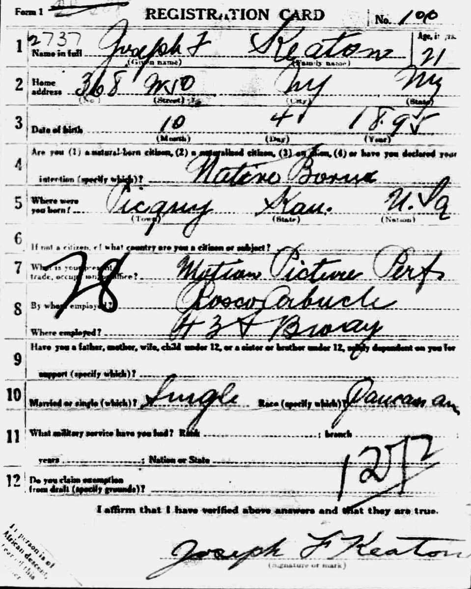 A 1917 United States draft registration card with twelve numbered questions answered in ink and large clerical numbers written across it
