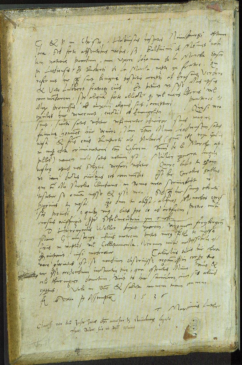 Autograph letter in fast humanist cursive filling a full page, signed at the bottom with a cross and the name Martinus Luther