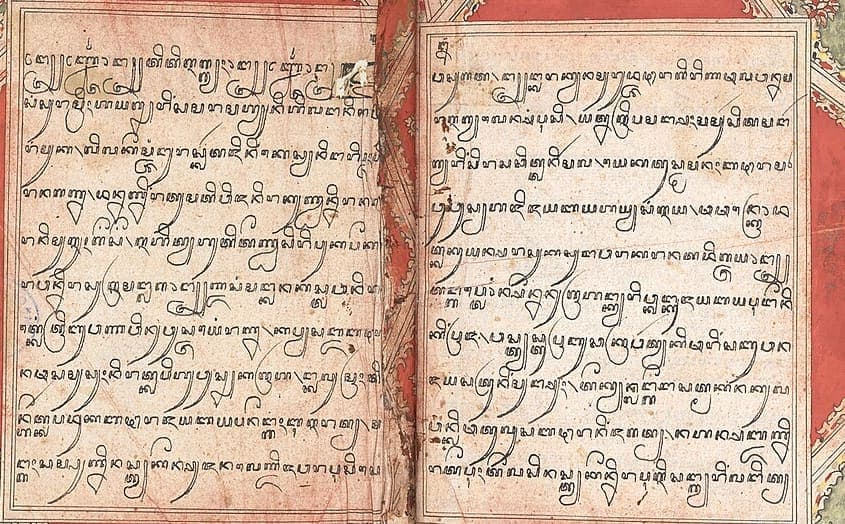Two facing text panels of a Javanese manuscript in Aksara Jawa, set inside a red and green illuminated frame