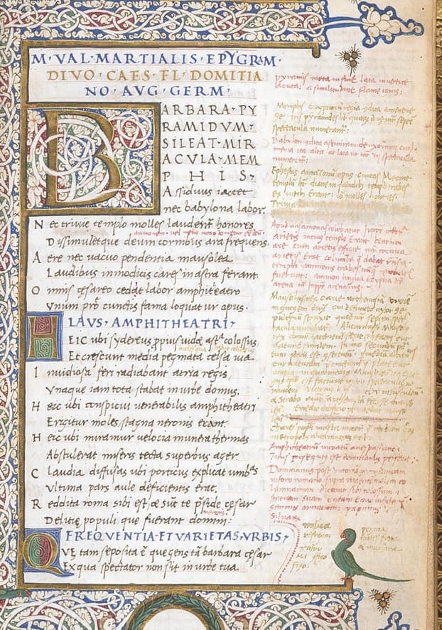 Decorated page of a Martial manuscript with a white-vine border, epigrams in humanistic cursive, blue capital rubrics and a full column of small annotations in the outer margin