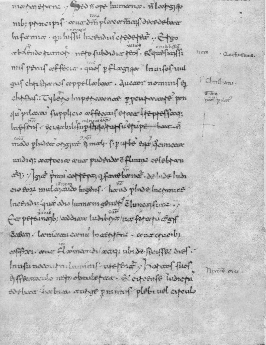 Part of a manuscript page in small upright Beneventan minuscule, with short notes added in the right margin beside the text