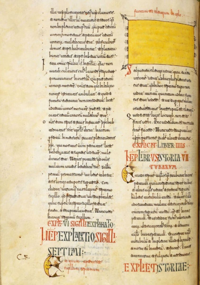 Two-column Visigothic minuscule text page from a Spanish manuscript of a commentary on the Apocalypse, with red rubrics