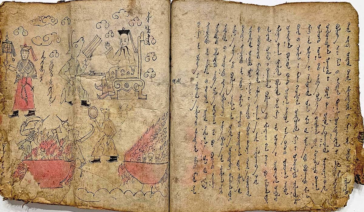 Open spread of a worn manuscript book, dense columns of vertical Mongolian script down the right-hand page and a coloured ink drawing of figures in flaming cauldrons on the left