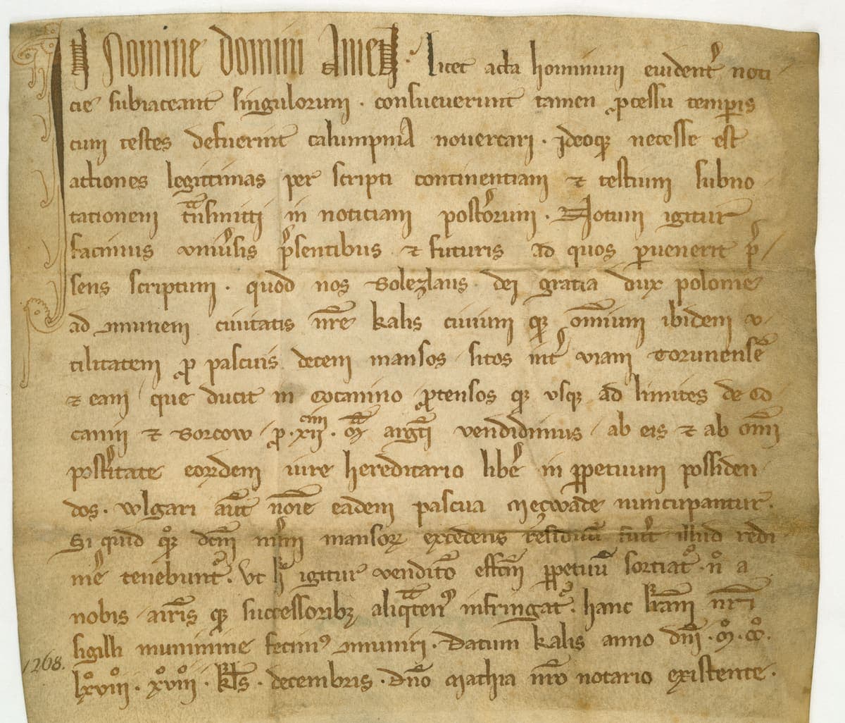 Thirteenth-century ducal charter on parchment, eighteen lines of Gothic documentary script with a large decorated opening initial and a dating clause in Roman numerals