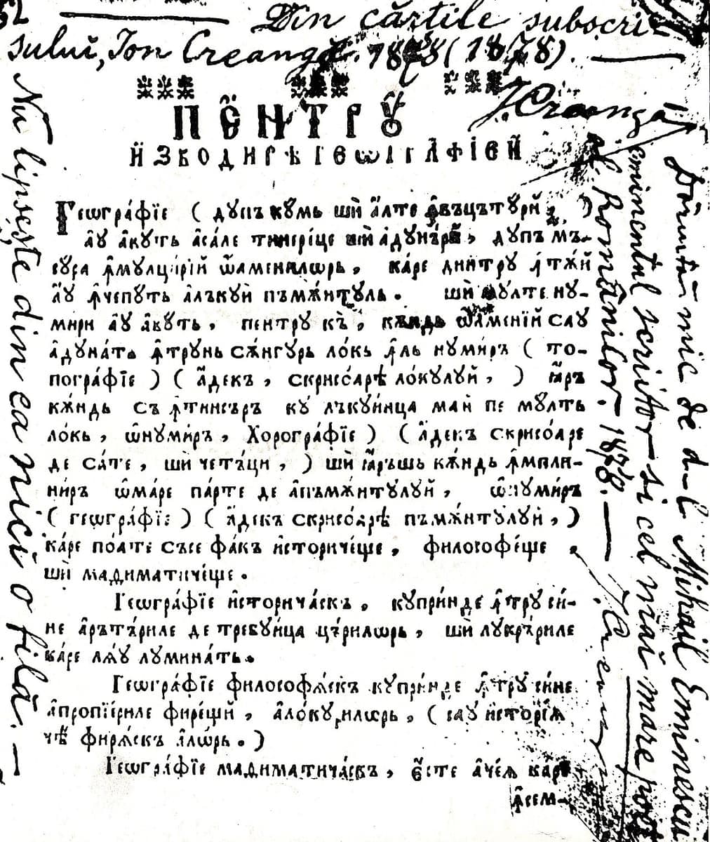 Printed page of a Romanian Cyrillic geography primer surrounded by handwritten Latin-script marginalia by Ion Creangă