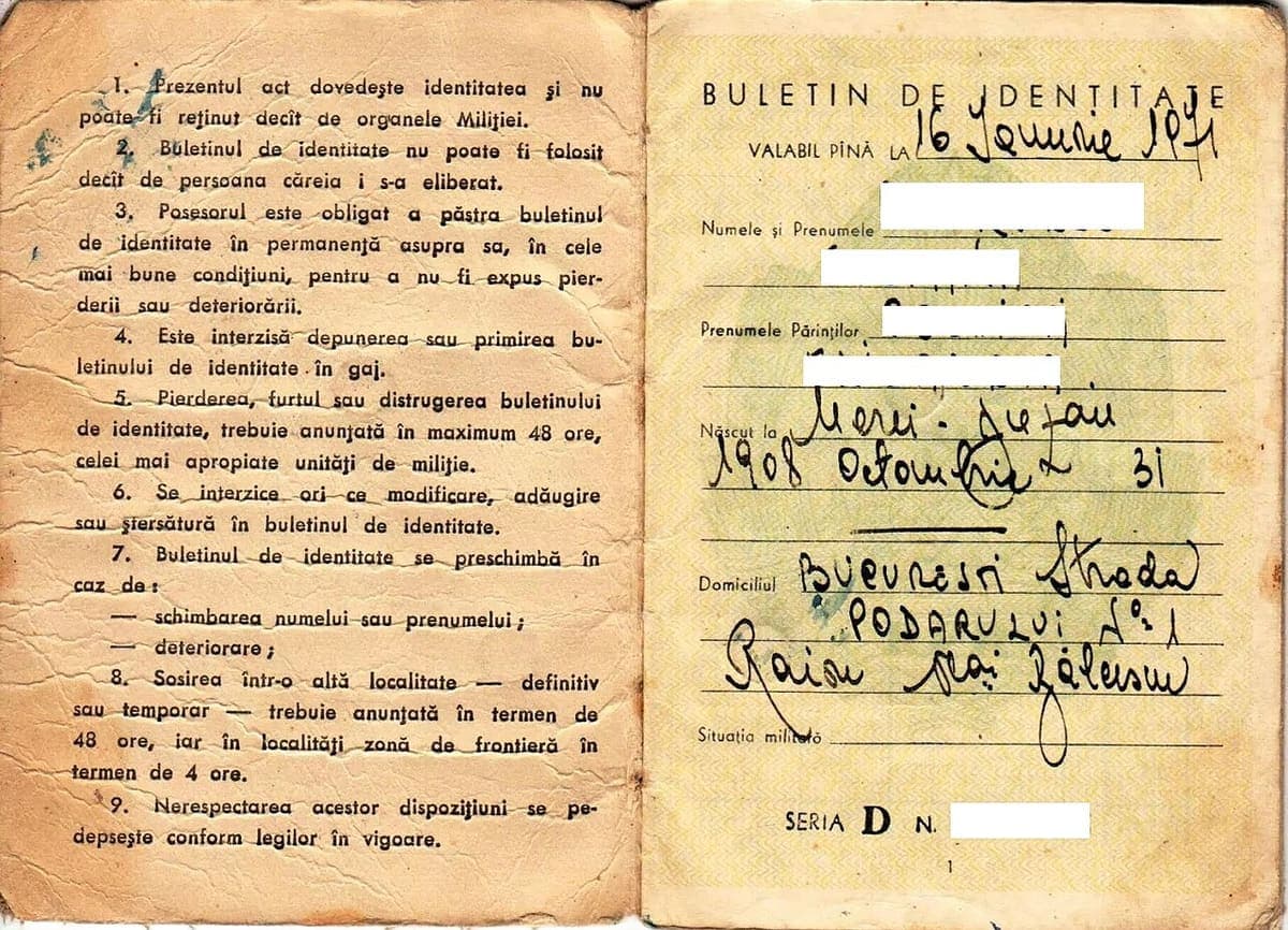 Open Romanian identity booklet from 1961 with printed regulations on the left leaf and handwritten personal details on the right
