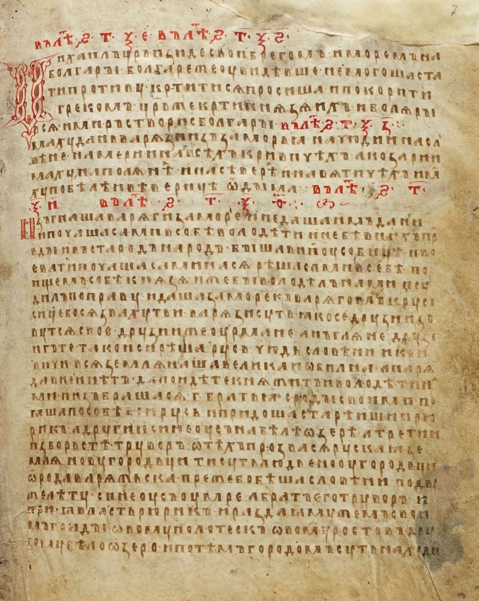 Parchment chronicle page in brown early poluustav, with red initials opening several annual entries