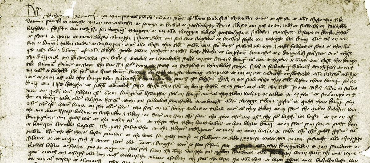 Top of a large paper sheet of 1397 covered in close-set Danish chancery cursive, with a decorated first letter