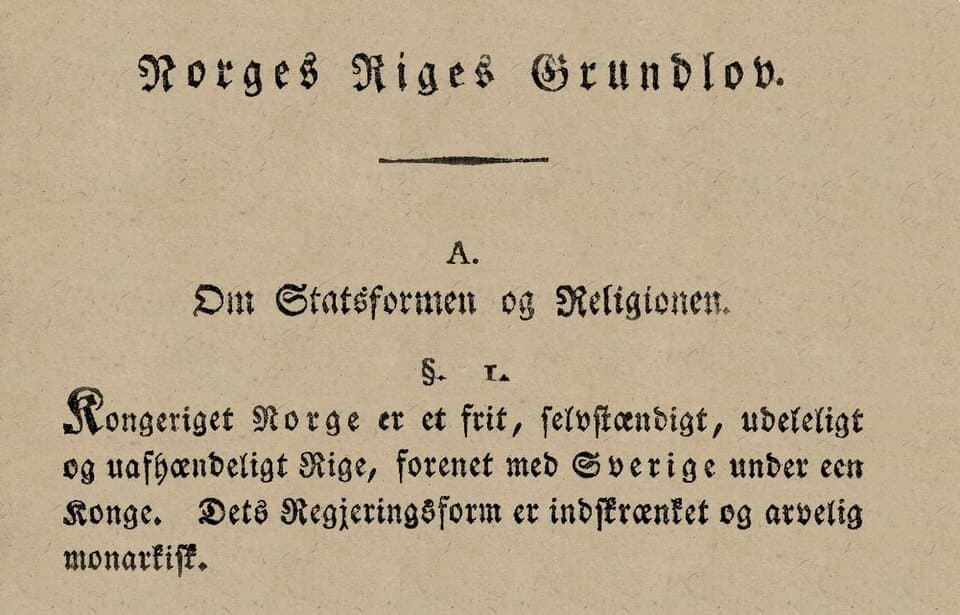 Printed page in blackletter type with the heading Norges Riges Grundlov above a first paragraph beginning Kongeriget Norge