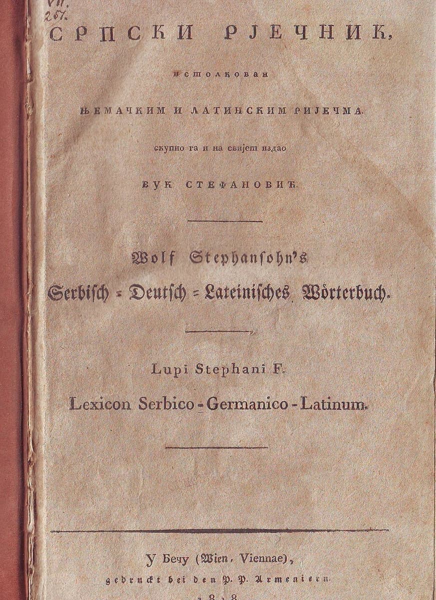 Worn title page reading СРПСКИ РЈЕЧНИК in large Cyrillic capitals, with German and Latin subtitles and a Vienna imprint date of 1818