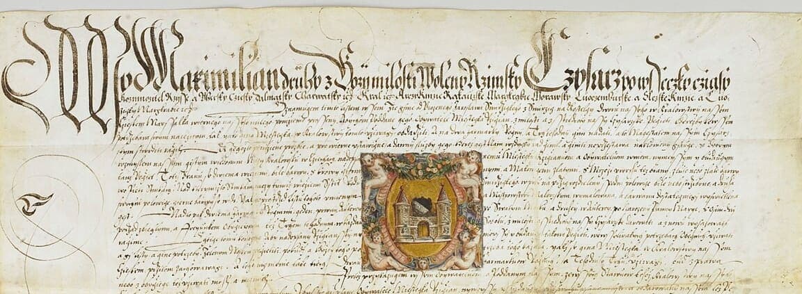 Parchment privilege with a flourished opening line, an even chancery hand and a painted shield showing a town gate in the middle of the text