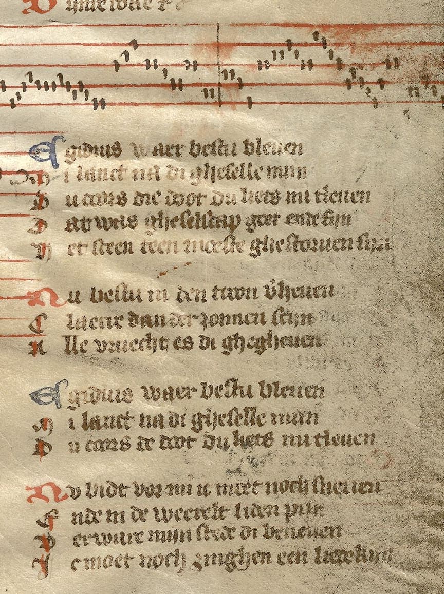 Lower right part of folio 28r of the Gruuthuse manuscript: a red stave with stroke notation above the stanzas of the Egidius song in a small hybrida