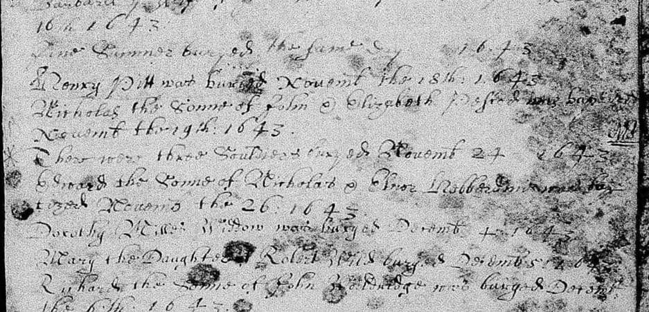 A mould-spotted page of a parish register with burial entries in a seventeenth-century hand, several words obscured by dark blotches