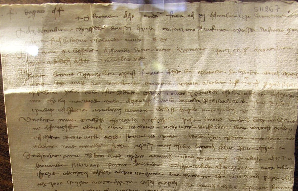 Upper half of a merchant letter of 1390 written in dense mercantesca, with Arabic figures for quantities of spices standing out among the words