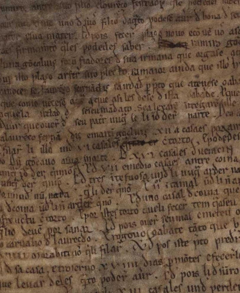 Crowded lines of a thirteenth-century parchment memorandum with struck-through passages and words squeezed between the rules