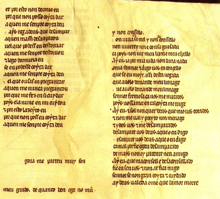 Two ruled columns of Gothic textualis verse from a thirteenth-century Portuguese songbook, with two widely spaced unfinished lines at the foot of the left column