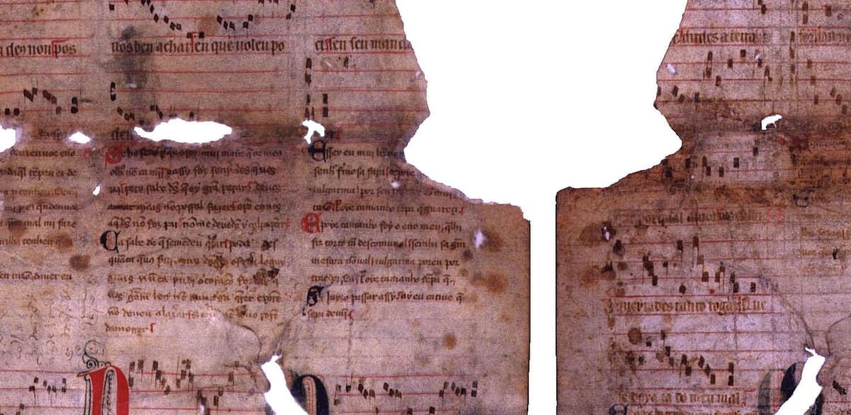 A stained and torn parchment fragment with strophes written as continuous lines under red and blue initials, holes interrupting the words