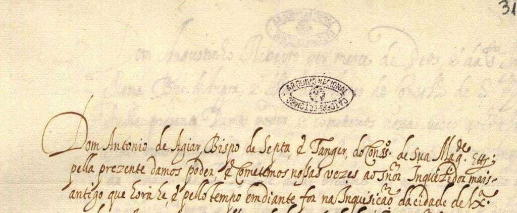 The opening lines of a 1614 commission written across a page, the folio number 31 at the top right and two oval archive stamps struck over the faded entry above